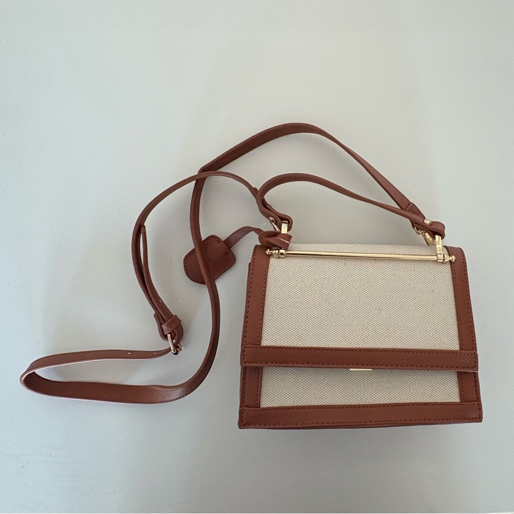 Tan and Cream Crossbody Bag with Flap Closure